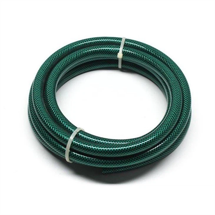 green pvc tree outside hose